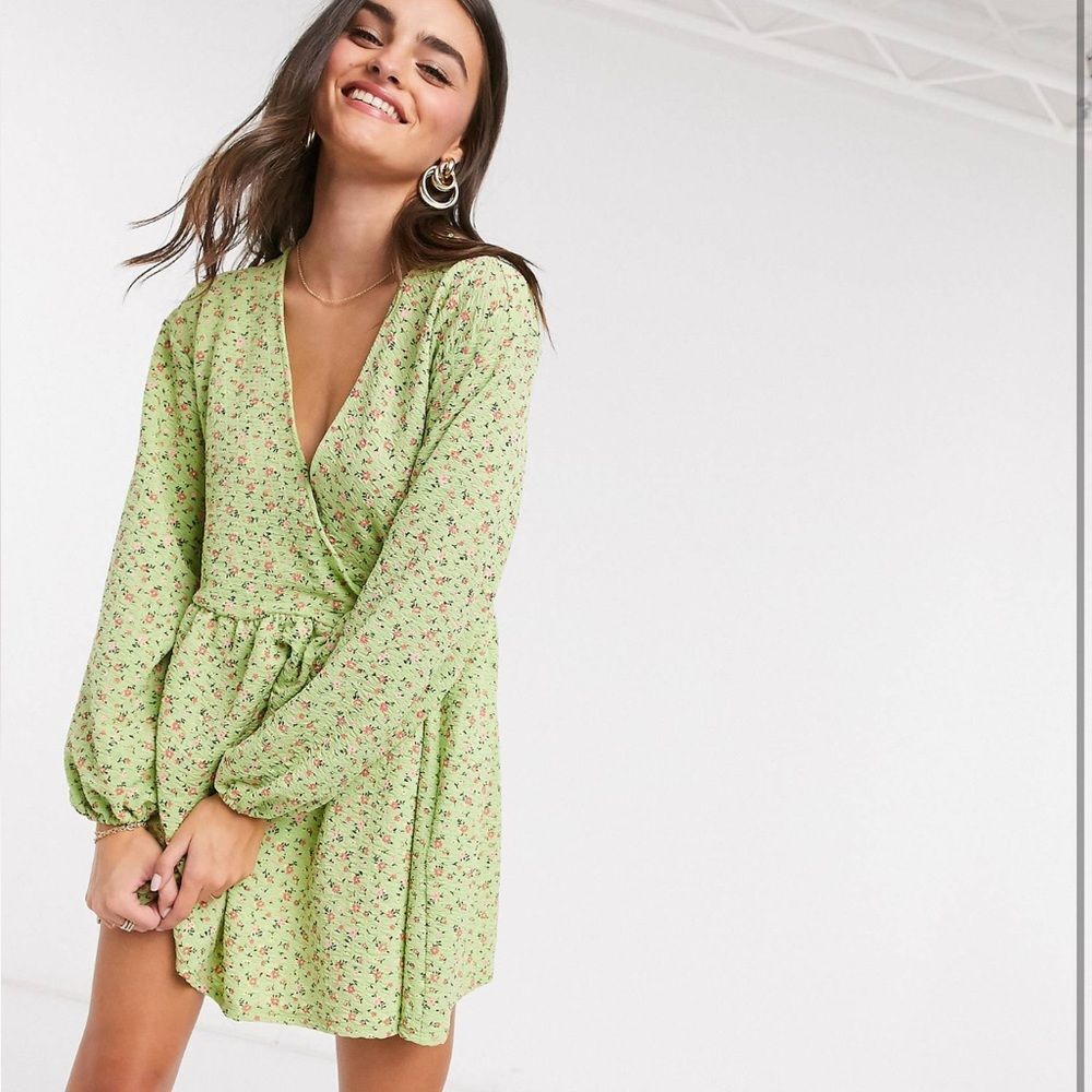 ASOS design smocked oversized mini wrap dress in green ditzy floral. Nev…